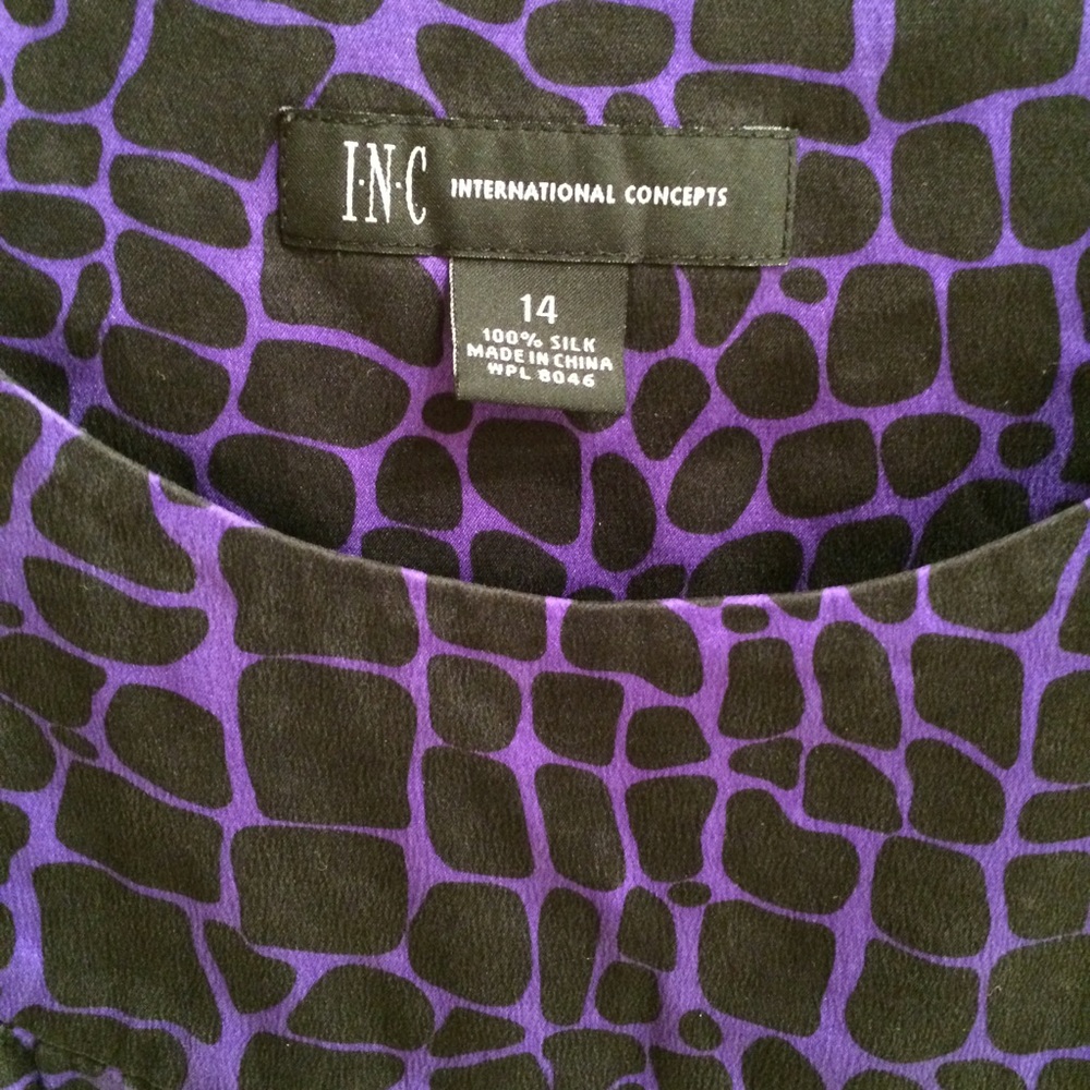 Purple/black giraffe print blouse.